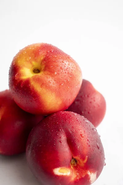 stock image Fresh nectarines. on white background. close-up.