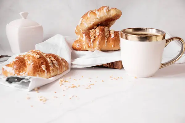 Coffee and buns. on a white background. Breakfast. Morning
