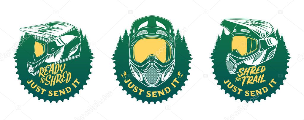 Set of vector mountain biking badges with full face helmet, goggles and pine trees