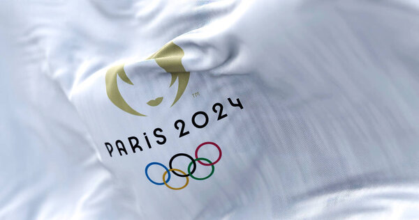 Paris, FR, October 2022: Close-up view of the Paris 2024 Summer Olympics flag waving in the wind. The XXXIII Olympic Games will be held in Paris, France, from 26 July to 11 August 2024.