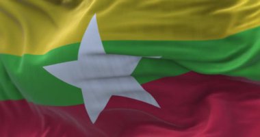 Myanmar 'ın ulusal bayrağının dalgalanmasına yakından bakın. Myanmar Cumhuriyeti, Güneydoğu Asya devletinde bir şehirdir. Kumaş desenli arka plan. Seçici odaklanma. Yavaş çekimde kusursuz döngü. 3 Boyutlu Hazırlama