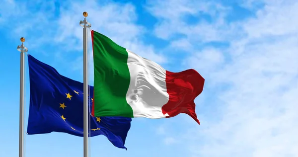 the flags of Italy and the European Union waving in the wind on a sunny day. Democracy and politics. European country. 3d illustration