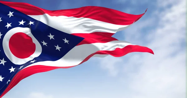 stock image The Ohio state flag waving in the wind on a clear day. Ohio is a state in the Midwestern region of the United States. 3d illustration