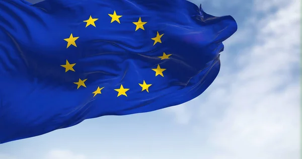 Close-up view of the European Union flag waving in the wind. The European Union is a political and economic union of 27 member states that are located primarily in Europe. 3d illustration