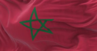 Rüzgarda dalgalanan Fas ulusal bayrağının yakın plan görüntüsü. Fas Krallığı, Kuzey Afrika 'da bir ülkedir. Kumaş desenli arka plan. Seçici odaklanma. Ağır çekimde sonsuz döngü. 3 Boyutlu Hazırlama