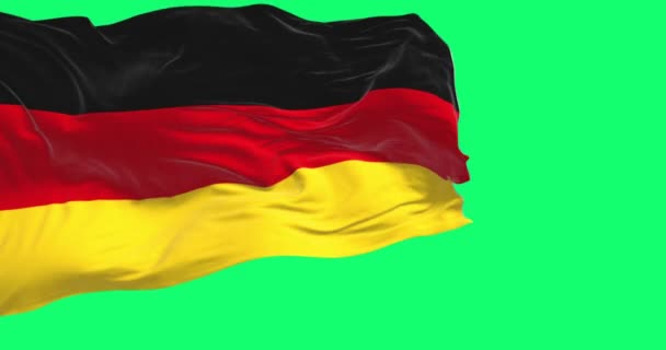 緑の背景にドイツの旗を振っている ドイツ連邦共和国は 中央ヨーロッパの国です スローモーションでシームレスにループします 現実的な3Dレンダリング グリーンスクリーンマットとクロマキー — ストック動画