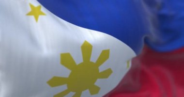 Philippines national flag waving. The Republic of the Philippines is an archipelagic country in Southeast Asia. Rippled textured fabric. Selective focus. Realistic 3D render. Slow motion loop