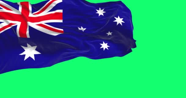 澳大利亚国旗在绿色的背景上飘扬 与世隔绝 蓝色的旗帜与联合杰克 白色的5尖明星象征着南方十字 3D渲染 绿色屏幕垫和色键 慢动作回路 — 图库视频影像