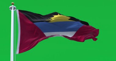 Antigua and Barbuda national flag waving isolated on a green background. Antigua and Barbuda is an island state of Central America. 3D render. Green screen matte and chroma key. Slow motion loop