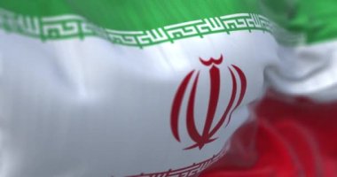 The Iran national flag waving. The Islamic Republic of Iran is a State of Asia located on the Middle East. Close-up. Selective focus. Rippled fabric. Realistic 3D render. Slow motion loop