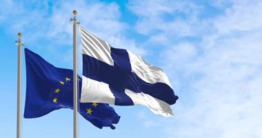 The flags of Finland and the European Union waving together on a clear day. Finland became a member of the European Union on 1995. Realistic 3d render animation. International treaty and diplomacy