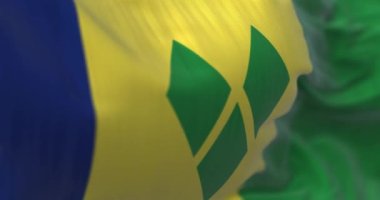 Saint Vincent and the Grenadines national flag waving. It is a state in the Lesser Antilles of Central America. Close-up. Selective focus. Rippled fabric. 3D render animation. Slow motion loop