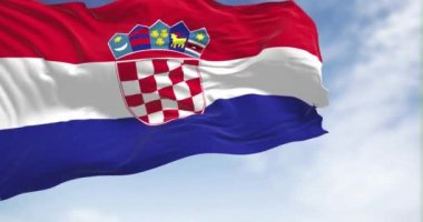 The national flag of Croatia waving in the wind on a clear day. Red, white and blue horizontal stripes with coat of arms in center. Rippled fabric. Slow motion loop. Realistic 3d render animation.