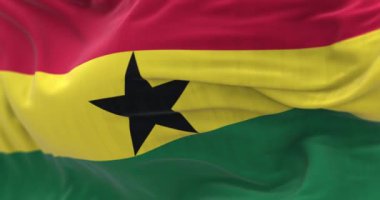 Ghana National flag waving. Red, yellow, green stripes, black star in center. Symbolizes pan-African unity. Close-up. Selective focus. Rippled fabric. Realistic 3D render animation. Slow motion loop