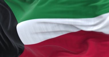Kuwait national flag waving in the wind. The State of Kuwait is a country in Western Asia. Close-up. Selective focus. Rippled fabric. Realistic 3D render animation. Slow motion loop