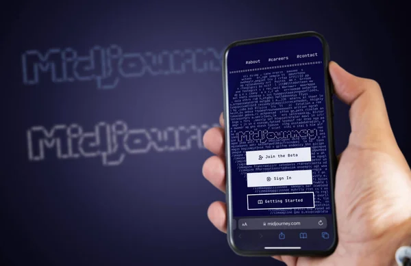 San Francisco US, Dec 2022: A hand holding a phone with the Midjourney website on the screen. Midjourney is an artificial intelligence that creates images from textual descriptions
