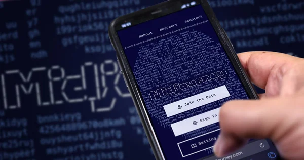 San Francisco US, Dec 2022: A hand holding a phone with the Midjourney website on the screen. Midjourney is an artificial intelligence that creates images from textual descriptions. Illustrative editorial