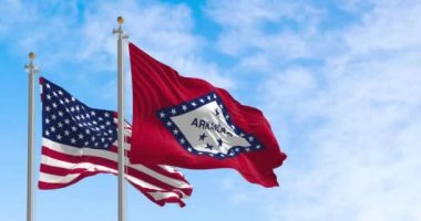 Arkansas state flag waving with the national flag of the United States of America on a clear day. Rippled textile. 3d render animation. Slow motion loop.