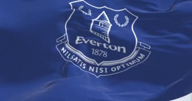 Liverpool, UK, sept 2022: Everton FC flag waving. Everton is a professional english football club. Selective focus. 3d render animation. Slow motion loop. Close-up.