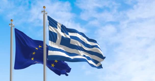 ギリシャと欧州連合 の旗は 晴れた日に一緒に手を振っています ギリシャは1981年に欧州連合の一員となった 3Dレンダリングアニメーション 国際条約 — ストック動画