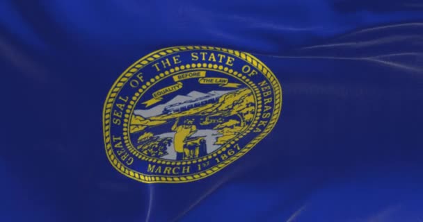 Primer Plano Bandera Del Estado Nebraska Ondeando Bandera Azul Con — Vídeo de stock