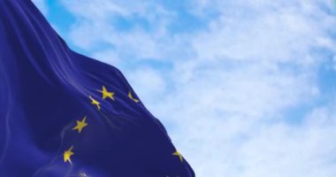 Detail of the flag of the European Union waving on a clear day. 12 yellow stars on a blue background.  3d render animation. Slow motion loop. Rippled fabric.