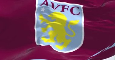 Birmingham, İngiltere, Şubat 2023: Aston Villa Futbol Kulübü bayrağı dalgalanıyor. Aston Villa, İngiliz profesyonel futbol kulübüdür. 3D canlandırma canlandırması. Yavaş çekim döngüsü. Yakın plan. Desenli kumaş arkaplanı