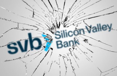 Santa Clara, USA, March 2023: Broken glass with the Silicon Valley Bank logo blurred in the background. Bank run and bankruptcy. Finance and economy. Illustrative editorial clipart