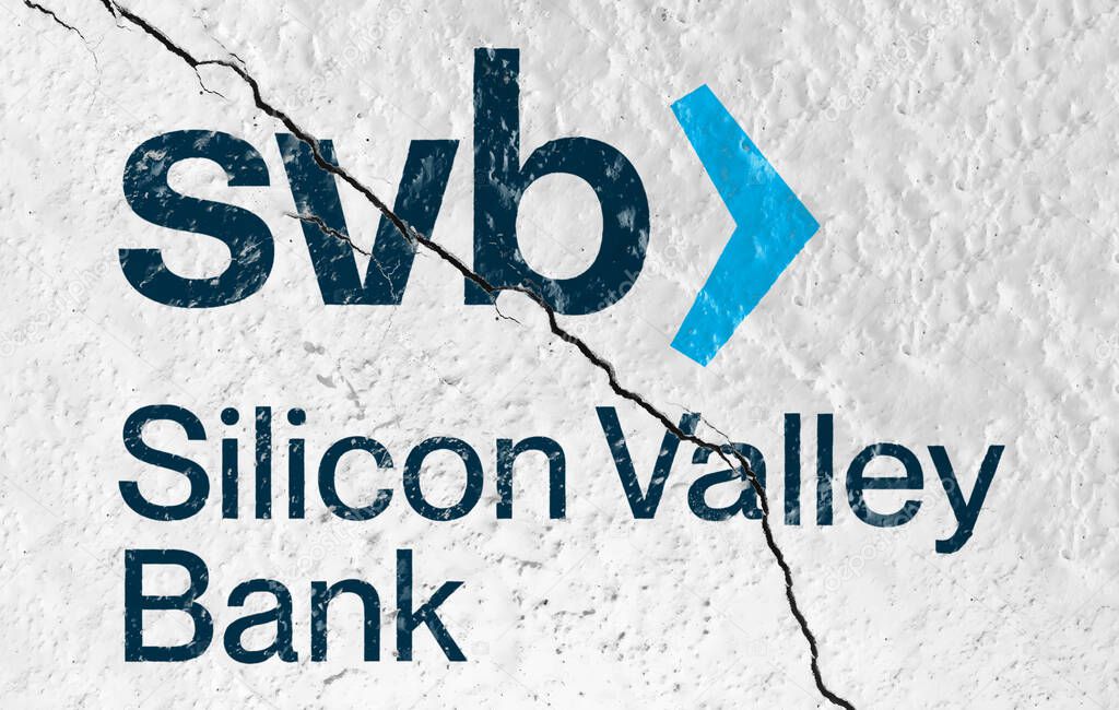 Santa Clara, USA, March 2023: The Silicon Valley Bank logo broken by a crack. In 2023, SVB suffered the second largest bank failure in American financial history. Illustrative editorial.