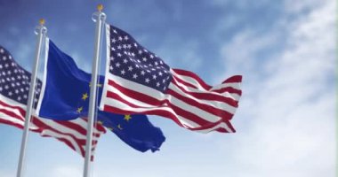 Amerika Birleşik Devletleri ve Avrupa Birliği 'nin bayrakları açık bir günde rüzgarda sallanıyor. Kusursuz 3 boyutlu animasyon. Seçici odaklanma. Yavaş çekim döngüsü. Uluslararası politika, ittifak