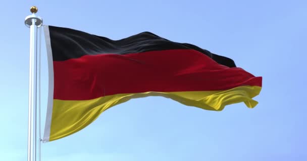 德国国旗在晴天迎风飘扬 三个水平带黑色 红色和金色 无缝3D渲染动画 有选择的重点 慢动作回圈四 后续行动 — 图库视频影像