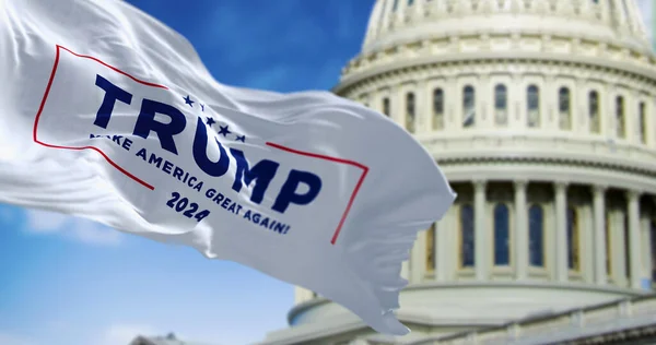 华盛顿特区 2023年3月 印有唐纳德 特朗普2024年总统竞选标志的国旗在前面摇曳 模糊了美国国会 说明性编辑3D说明 — 图库照片
