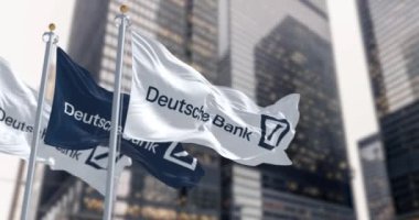 Berlin, DE, Mart 2023: Deutsche Bank finans bölgesinde dalgalanan bayraklar. Mart 2023 'te Deutsche Bank bir borsa çöküşü yaşadı. 3D canlandırma canlandırması. Ağır çekim. Kusursuz döngü. Seçici odak.