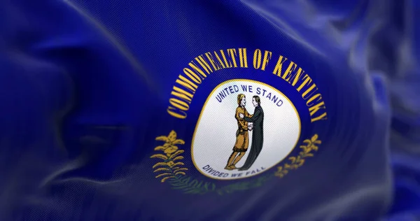 The US state flag of Kentucky waving. Two men embracing, motto \