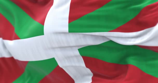巴斯克国的国旗飘扬 西班牙自治区 在红色的田野上 白色的交叉在绿色的盐渍之上 有选择的重点 无缝3D渲染动画 慢动作回圈有选择的重点 后续行动 — 图库视频影像