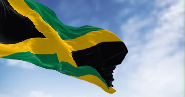 자메이카의 국기가 바람에 흔들리고 있습니다 그것을네 검정으로 나누어 일러스트 렌더링 — 스톡 사진