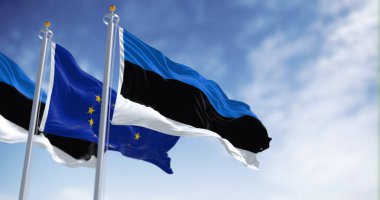 The flags of Estonia and the European Union waving together on a clear day. Estonia became a member of the European Union on May 1, 2004. Realistic 3d illustration. International treaty and diplomacy