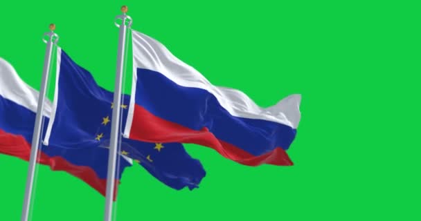 Rusland Vlaggen Van Europese Unie Wapperen Geïsoleerd Een Groene Achtergrond — Stockvideo