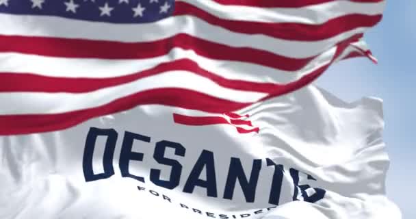 2023年4月米国タラハシー デサンティス2024共和党の大統領予備選挙運動旗が振っている 3Dレンダリングアニメーション スローモーションループ 選択的フォーカス リップリング生地 接近中だ 4K解像度 — ストック動画