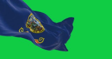 Idaho eyaleti bayrağı yeşil arka planda izole edilmiş. Kusursuz 3D canlandırma animasyonu. Yeşil ekran. Krom anahtar. Yavaş çekim döngüsü. 4K çözünürlüğü