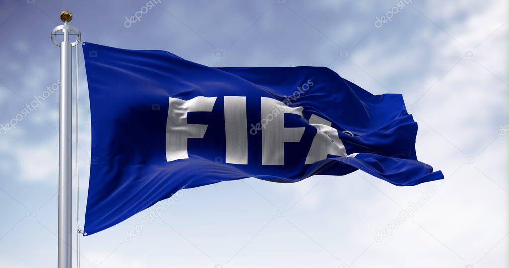 Zurich, CH, June 17 2023: Fifa flag waving in the wind on a clear day. International governing body of association football, beach football and futsal. Illustrative editorial 3D illustration render