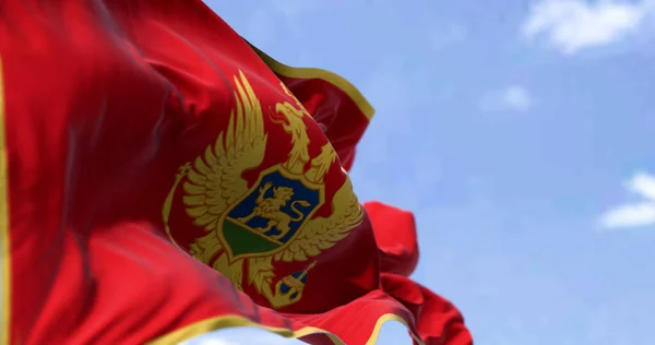 Nationell Flagga Montenegro Vinka Vinden Klar Dag Röd Med Guldkant — Stockfoto