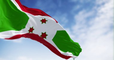 Burundi 'nin ulusal bayrağı açık havada dalgalanıyor. Kırmızı ve yeşil bölümlere bölünen beyaz köşegen, ortada üç yeşil yıldız. 3D illüstrasyon canlandırıcı. Kanat çırpan kumaş. Seçici odak