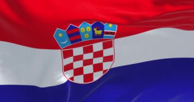 Hırvatistan 'ın ulusal bayrağı açık bir günde rüzgarda sallanıyor. Ortasında arma olan kırmızı, beyaz ve mavi yatay çizgiler. Kusursuz 3 boyutlu animasyon. Yavaş çekim döngüsü. 4k
