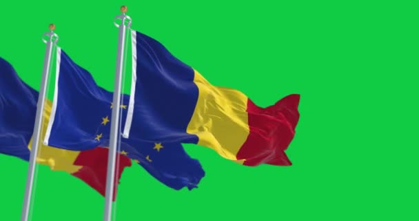 ルーマニアと欧州連合の旗は緑の背景で孤立した シームレス3Dレンダリングアニメーション グリーン スクリーン クロマキー スローモーションループ 4Kについて 選択的なフォーカス — ストック動画