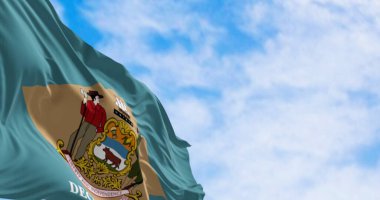 Delaware eyalet bayrağı açık havada dalgalanıyor. Sömürge mavisi arka plan, koyu renkli elmas ve devlet arması, ve altında da 7 Aralık 1787. 3D illüstrasyon canlandırıcı. Çırpınan kumaş