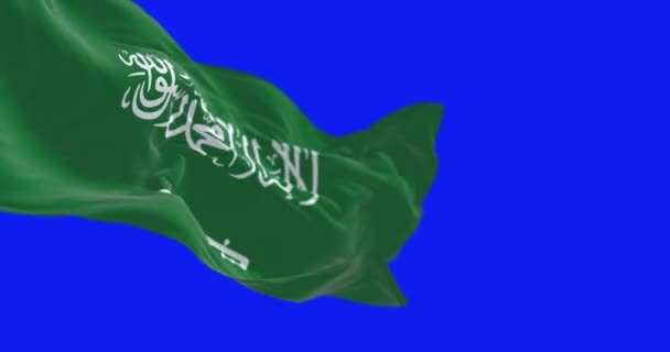 サウジアラビアの国旗は青い背景で孤立した グリーンフィールド シャーダと剣 トゥルースの脚本 シームレス3Dレンダリングアニメーション ブルースクリーン クロマキー スローモーションループ 4Kについて — ストック動画
