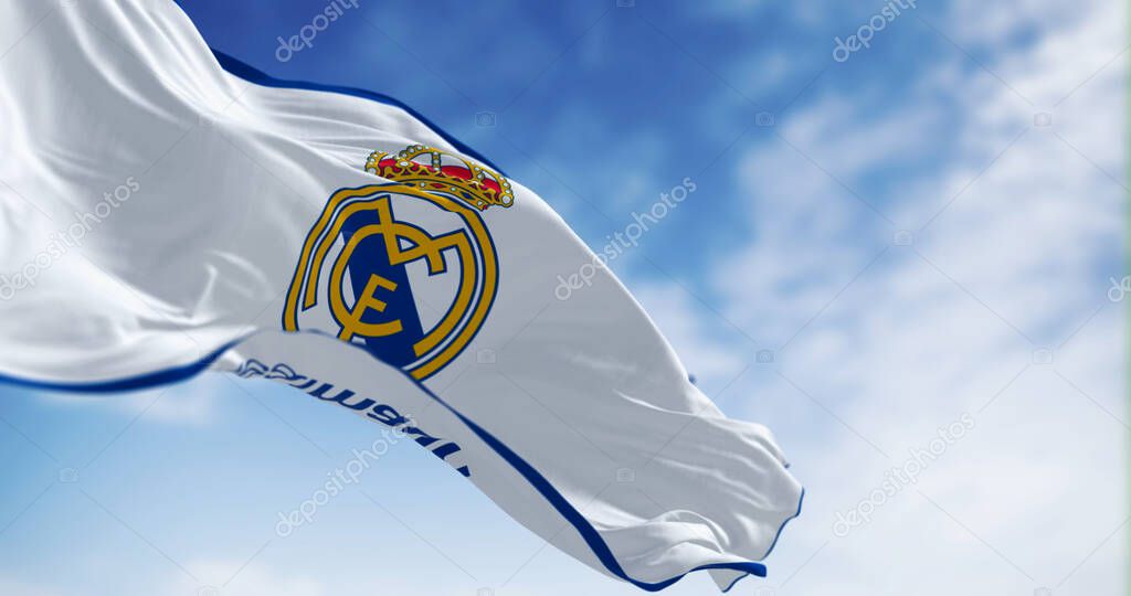 Madrid, Spain, May 2022: Real Madrid Club de Futbol flag waving in the wind. Spanish professional football club based in Madrid. Illustrative editorial 3d illustration render. Selective focus