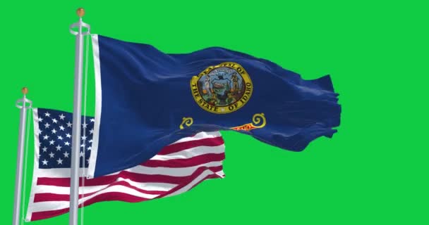 Idaho Och Usa Flaggor Vinkar Vinden Isolerad Grön Bakgrund Sömlös — Stockvideo