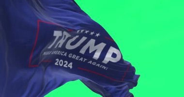 Arlington, ABD, 21 Temmuz 2023: Donald Trump bayrağı izole edildi. 2024 ABD başkanlık seçimi. Kusursuz 3D canlandırma animasyonu. Yeşil ekran. Krom anahtar. Yavaş çekim döngüsü. 4 bin. Seçici odak